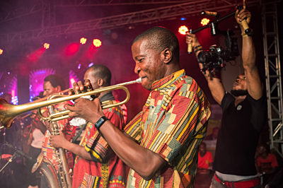 Afropolitan Man Blowing Trumpet